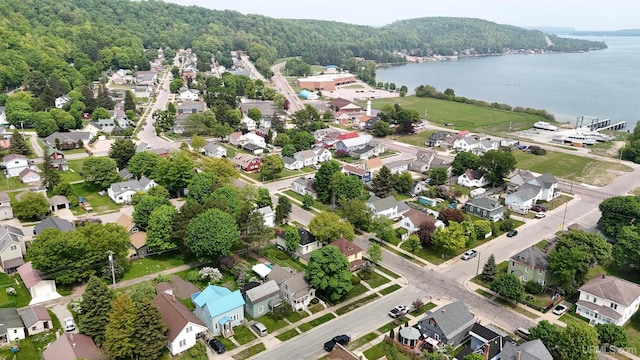 206 Cherry St, Munising, MI 49862 - aerial perspective of suburban area with a large body of water and a heavily wooded area