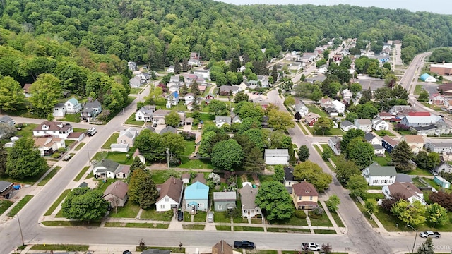 206 Cherry St, Munising, MI 49862 - aerial overview of property's location featuring a forest and nearby suburban area