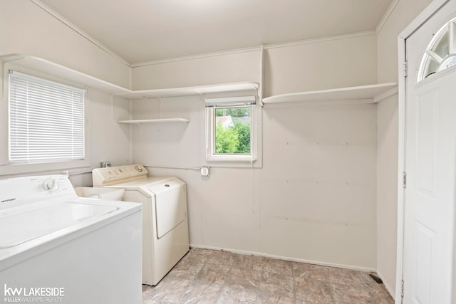 3620 Campbell St, Dearborn, MI 48124 - laundry room featuring separate washer and dryer and ornamental molding