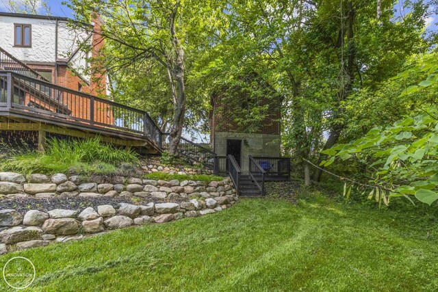 35727 Elm St, Wayne, MI 48184 - view of green lawn with a deck and stairs
