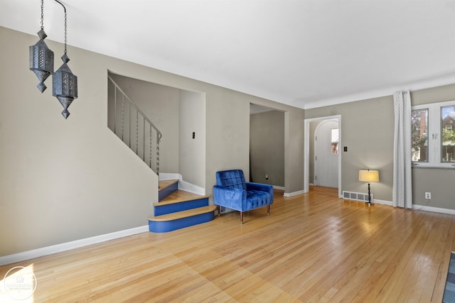 35727 Elm St, Wayne, MI 48184 - unfurnished room with wood-type flooring and stairway