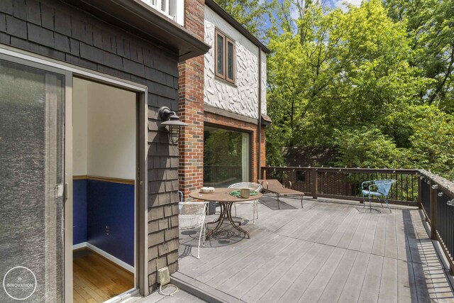 35727 Elm St, Wayne, MI 48184 - wooden terrace with outdoor dining area