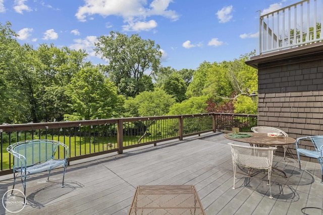 35727 Elm St, Wayne, MI 48184 - wooden deck with outdoor dining area