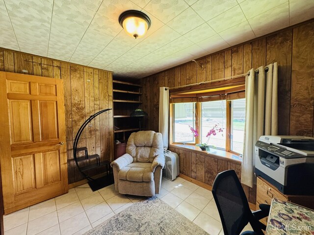 292 Chestnut St, Kingsford, MI 49802 - office with wood walls and light tile patterned floors