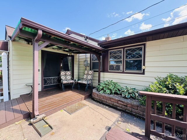 292 Chestnut St, Kingsford, MI 49802 - view of patio with a wooden deck