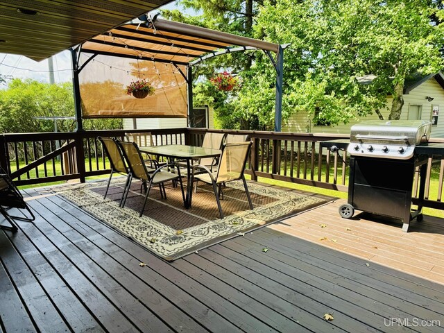 292 Chestnut St, Kingsford, MI 49802 - deck with a grill and outdoor dining area