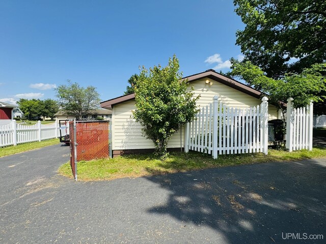 292 Chestnut St, Kingsford, MI 49802 - view of front of home featuring driveway