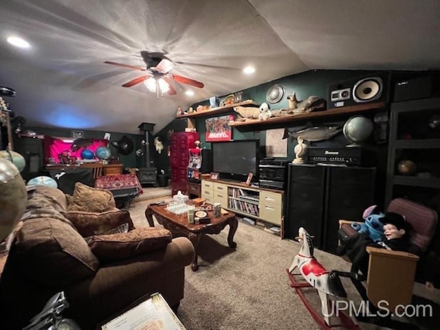 E2903 H44 Rd, Traunik, MI 49891 - living room featuring vaulted ceiling, ceiling fan, and carpet