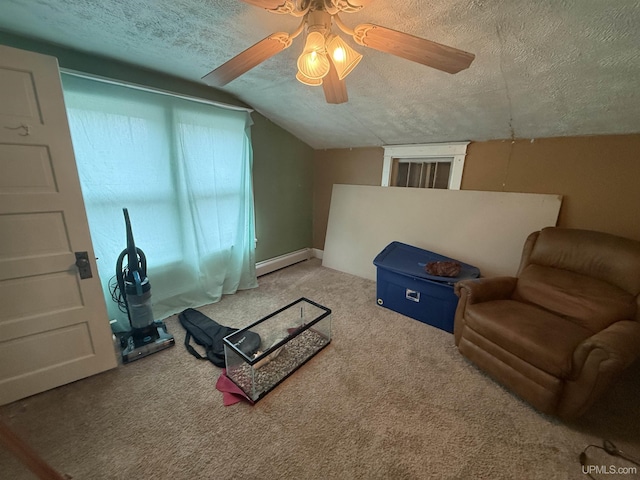 E2903 H44 Rd, Traunik, MI 49891 - living room featuring a textured ceiling, carpet floors, lofted ceiling, a ceiling fan, and a baseboard radiator