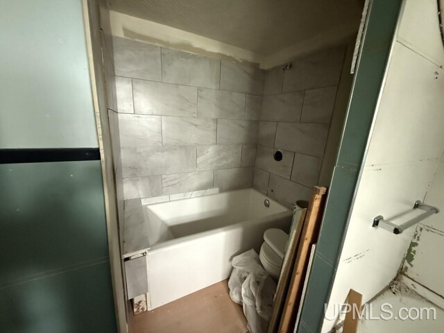 E2903 H44 Rd, Traunik, MI 49891 - full bath with washtub / shower combination