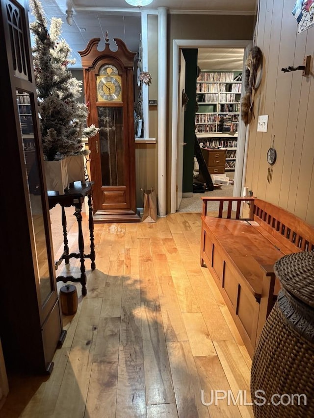E2903 H44 Rd, Traunik, MI 49891 - hall with light wood finished floors and wood walls