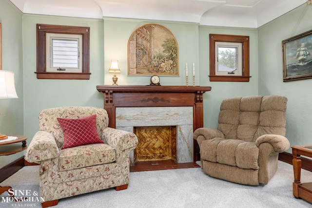 1258-1260 Lakepointe St, Grosse Pointe, MI 48230 - sitting room with plenty of natural light, carpet, and a high end fireplace