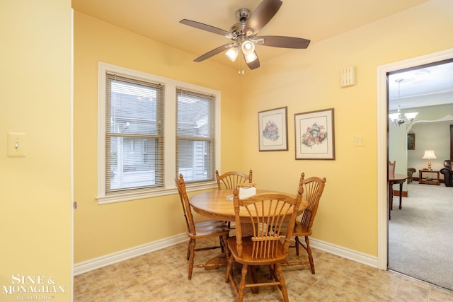 1258-1260 Lakepointe St, Grosse Pointe, MI 48230 - dining space featuring ceiling fan and a chandelier