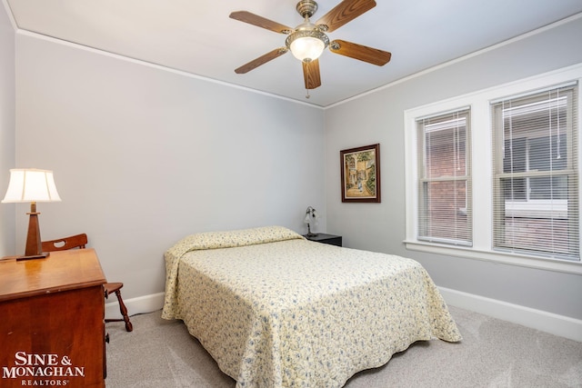 1258-1260 Lakepointe St, Grosse Pointe, MI 48230 - bedroom with light colored carpet, ornamental molding, and a ceiling fan