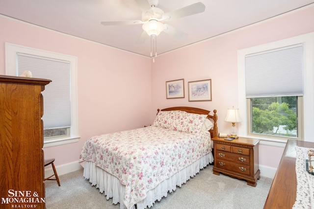 1258-1260 Lakepointe St, Grosse Pointe, MI 48230 - carpeted bedroom with baseboards and a ceiling fan