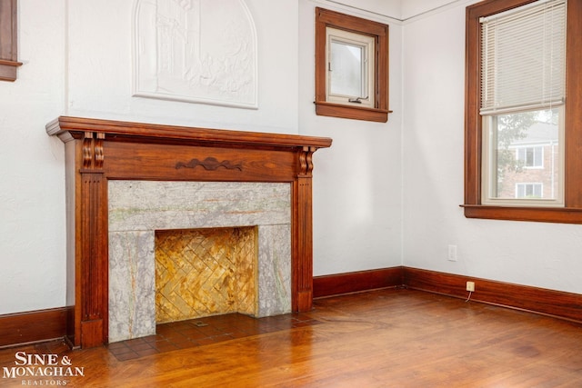 1258-1260 Lakepointe St, Grosse Pointe, MI 48230 - unfurnished living room with wood finished floors and a high end fireplace