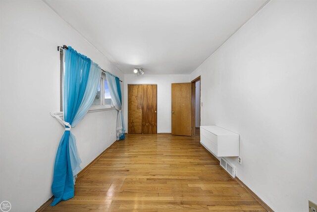 28368 Besmore Dr, Warren, MI 48093 - unfurnished room with light wood-style floors