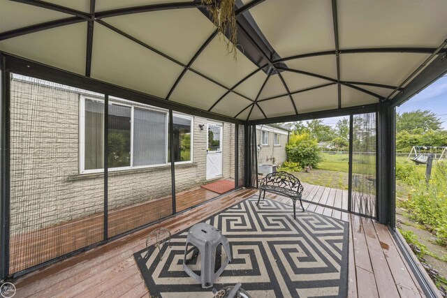 28368 Besmore Dr, Warren, MI 48093 - unfurnished sunroom with healthy amount of natural light and vaulted ceiling