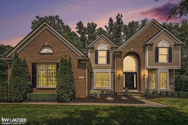 25986 Glenmoor St, Novi, MI 48374 - traditional-style home featuring a yard and brick siding