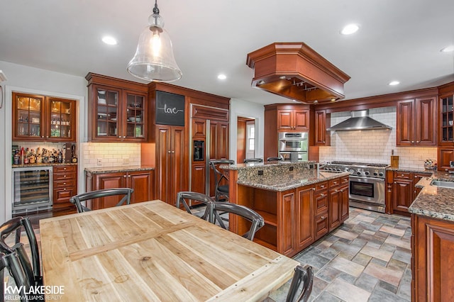 25986 Glenmoor St, Novi, MI 48374 - kitchen with high quality appliances, beverage cooler, wall chimney range hood, a kitchen island, and tasteful backsplash