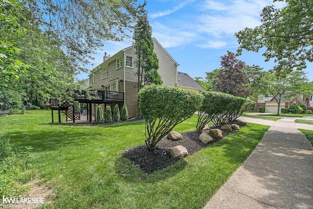 25986 Glenmoor St, Novi, MI 48374 - view of side of home featuring a wooden deck, a lawn, a chimney, and stairway