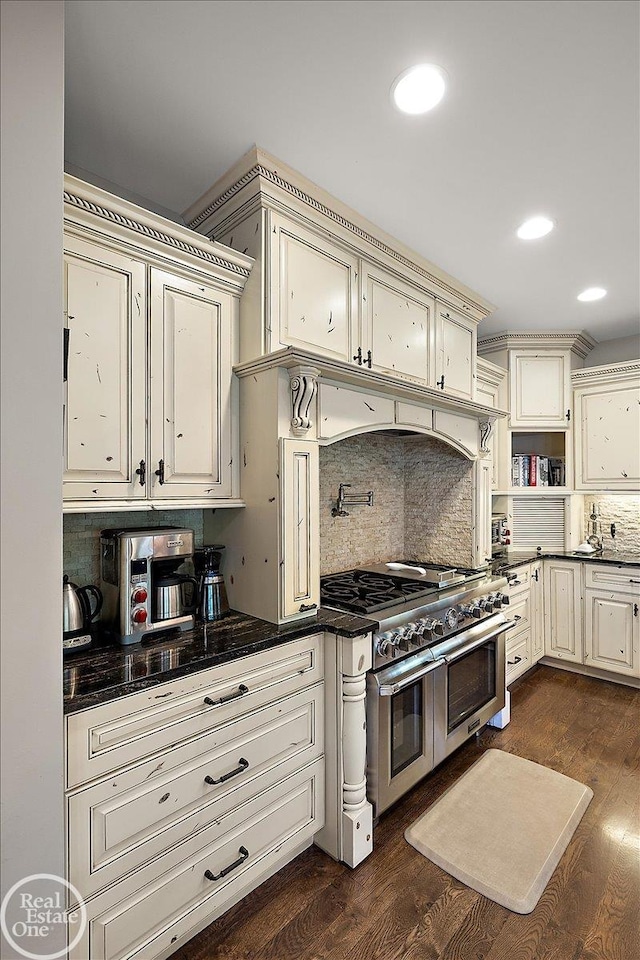 2940 Buell Rd, Oakland Twp, MI 48363 - kitchen with range with two ovens, backsplash, dark wood-style flooring, open shelves, and recessed lighting