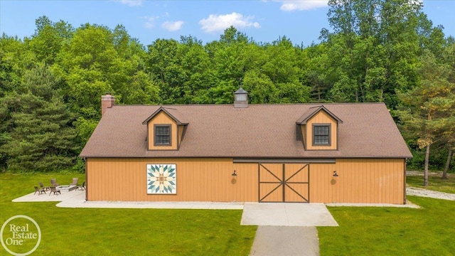 2940 Buell Rd, Oakland Twp, MI 48363 - view of front of property with a barn, a chimney, and a front yard