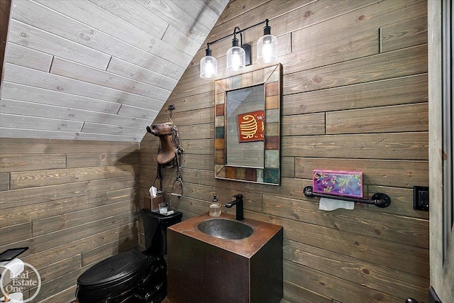2940 Buell Rd, Oakland Twp, MI 48363 - half bathroom with lofted ceiling, wooden walls, vanity, and wooden ceiling