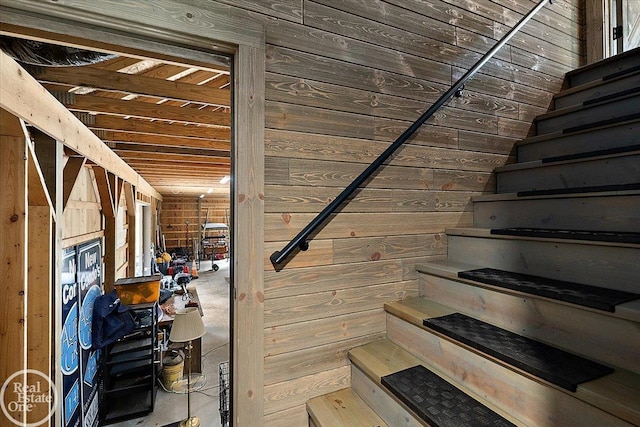 2940 Buell Rd, Oakland Twp, MI 48363 - staircase featuring wood walls