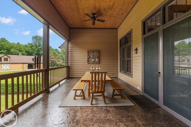 2940 Buell Rd, Oakland Twp, MI 48363 - sunroom featuring wood walls, a ceiling fan, wooden ceiling, and outdoor dining area