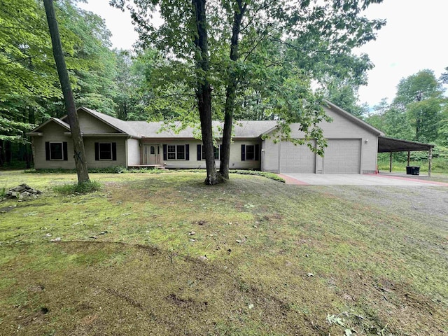 876 N Sanford Ln, Au Gres, MI 48703 - ranch-style house featuring concrete driveway, a garage, and a front lawn