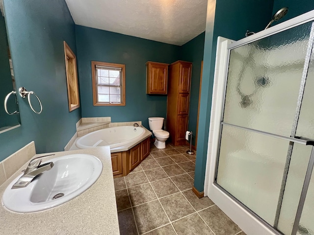876 N Sanford Ln, Au Gres, MI 48703 - full bathroom featuring a shower stall, a bath, tile patterned flooring, and a textured ceiling