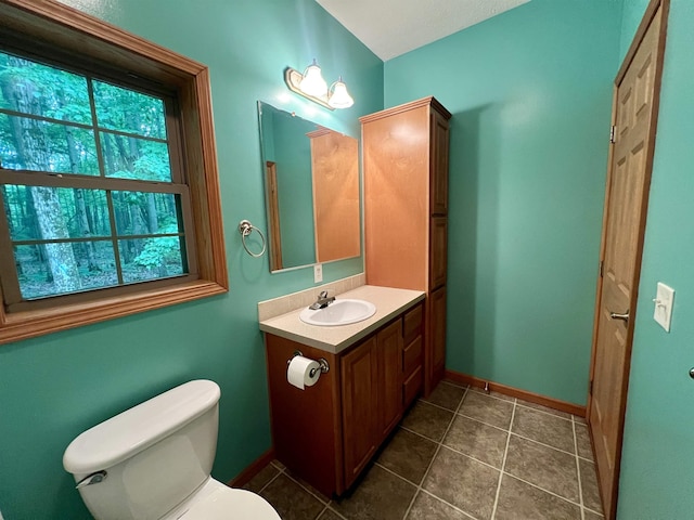 876 N Sanford Ln, Au Gres, MI 48703 - half bath featuring vanity and tile patterned floors