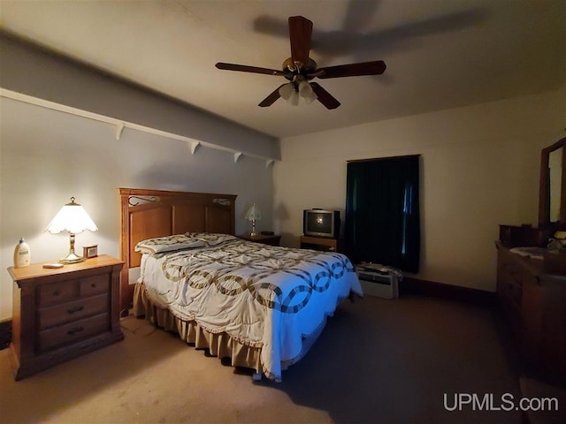 1249 Cedar St, Hancock, MI 49930 - carpeted bedroom featuring a ceiling fan
