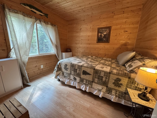 E8310 County Road 440th Hwy, Wetmore, MI 49895 - bedroom with wood walls, wood finished floors, and wood ceiling