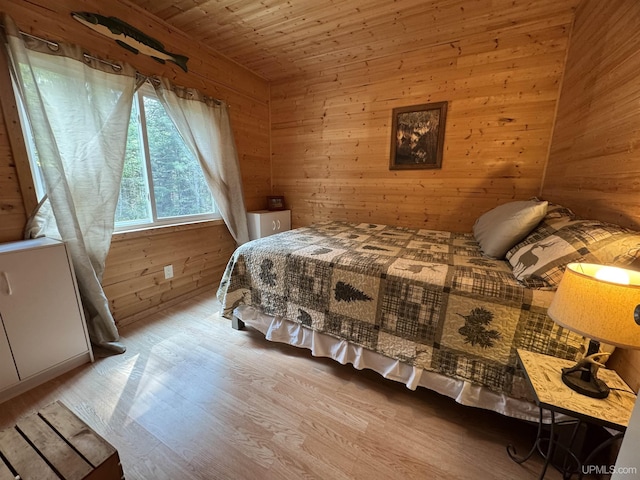 E8310 County Road 440th Hwy, Wetmore, MI 49895 - bedroom with wood walls, wood finished floors, and wood ceiling