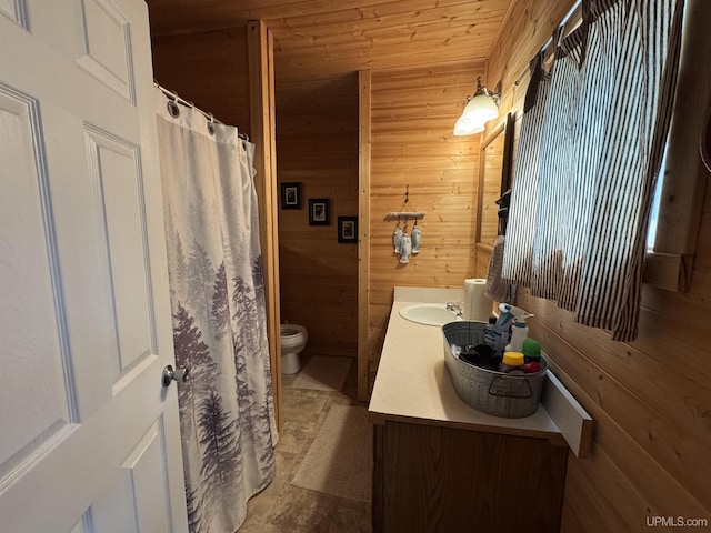 E8310 County Road 440th Hwy, Wetmore, MI 49895 - bathroom featuring wood walls, double vanity, and wood ceiling