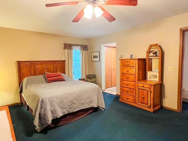 8855 Scotty Dr, Lake, MI 48632 - bedroom featuring dark colored carpet and ceiling fan