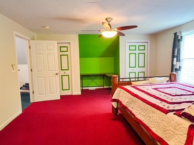 8855 Scotty Dr, Lake, MI 48632 - carpeted bedroom featuring a ceiling fan and baseboards