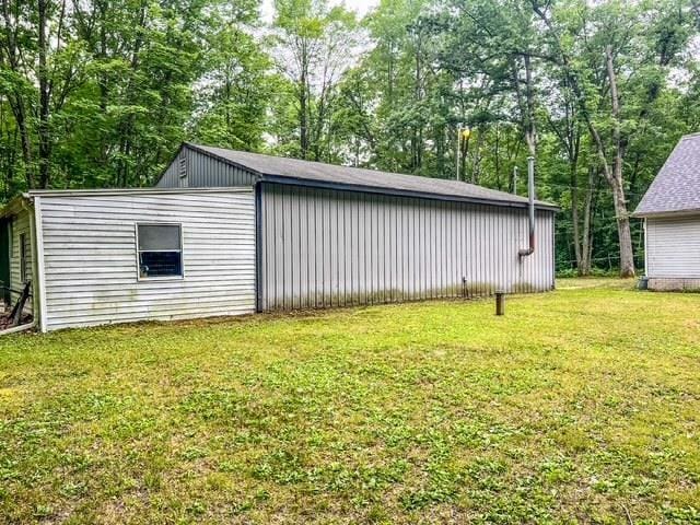 8855 Scotty Dr, Lake, MI 48632 - view of outdoor structure featuring view of wooded area