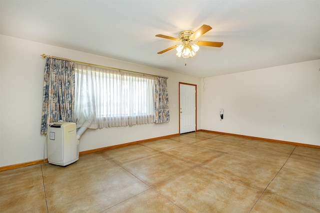 3833 Hermansau Rd, Saginaw, MI 48603 - spare room featuring a ceiling fan and finished concrete floors