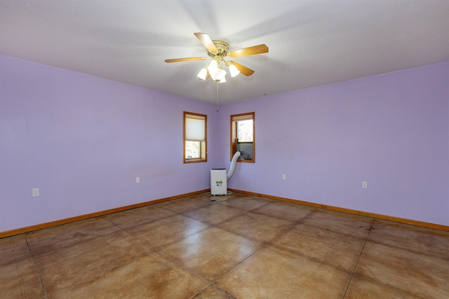 3833 Hermansau Rd, Saginaw, MI 48603 - spare room featuring finished concrete flooring and ceiling fan