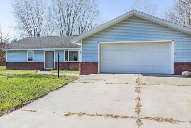 3833 Hermansau Rd, Saginaw, MI 48603 - ranch-style home with brick siding, a front lawn, a garage, and driveway