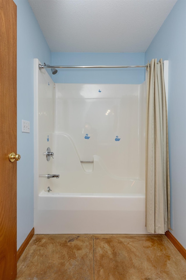 3833 Hermansau Rd, Saginaw, MI 48603 - bathroom with shower / bath combo with shower curtain and baseboards