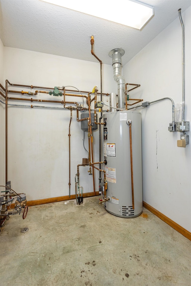 3833 Hermansau Rd, Saginaw, MI 48603 - utility room with water heater