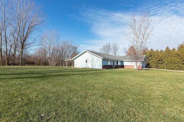3833 Hermansau Rd, Saginaw, MI 48603 - view of side of property featuring a lawn