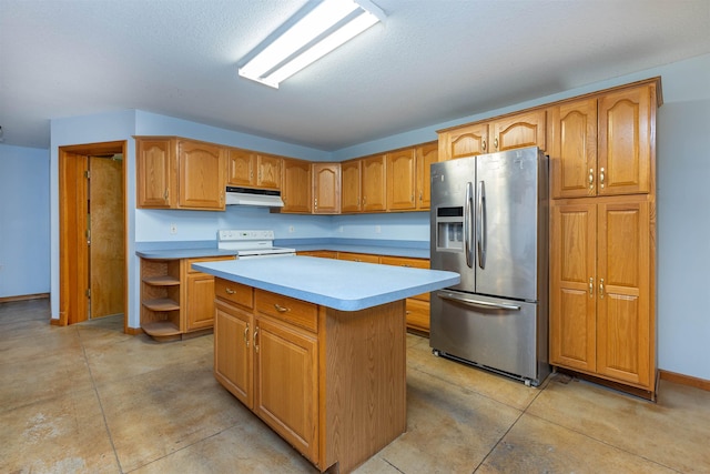 3833 Hermansau Rd, Saginaw, MI 48603 - kitchen featuring stainless steel fridge, under cabinet range hood, white electric range oven, light countertops, and a center island