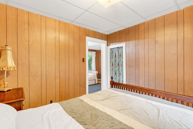 1159 S Lakeshore Rd, Carsonville, MI 48419 - bedroom with wood walls and carpet