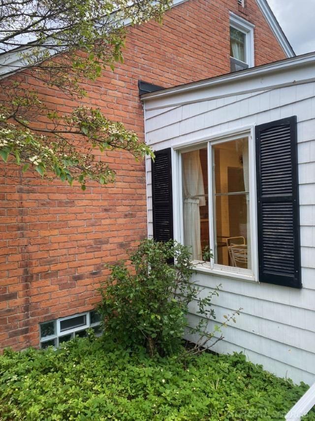 1782 Hollywood St, Grosse Pointe Woods, MI 48236 - view of home's exterior featuring brick siding