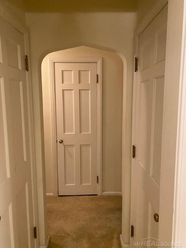 1782 Hollywood St, Grosse Pointe Woods, MI 48236 - hallway with carpet floors and baseboards